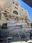 The hewn cliff, with hewn installations, and Aish HaTorah Yeshiva at its top, looking west.