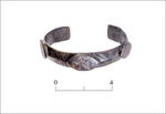 Metal bracelet that was found next to Grave 115.