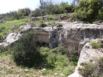 Burial Caves 24 and 25 and the shared courtyard, looking southeast.